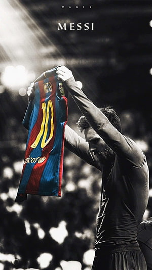 Lionel Messi Holding Up Barcelona Number 10 Jersey in Dramatic Stadium Lighting HD phone wallpaper