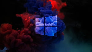 Windows 11 Logo Floating in Vibrant Red and Blue Ink Clouds on Black Background HD wallpaper