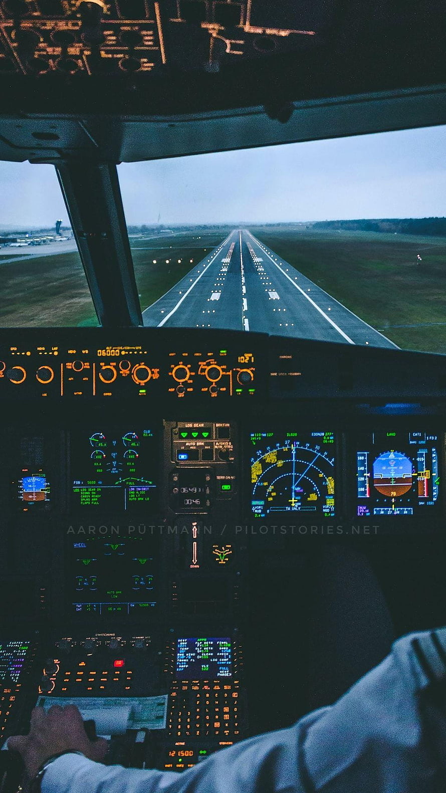 Commercial Aircraft Cockpit View During Runway Approach at Dusk HD phone wallpaper
