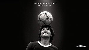 Diego Maradona Balancing Soccer Ball On Head In Black And White Tribute HD wallpaper