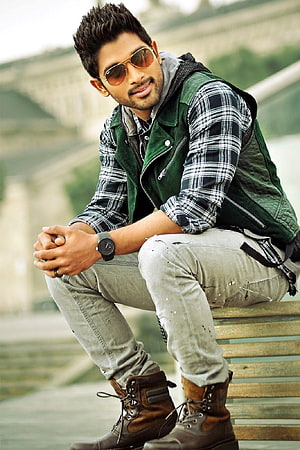 Allu Arjun in Green Vest and Plaid Shirt Sitting on Bench with Sunglasses HD phone wallpaper