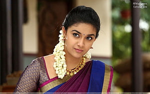 Keerthi Suresh in Traditional Saree with Jasmine Garland and Gold Jewelry HD wallpaper