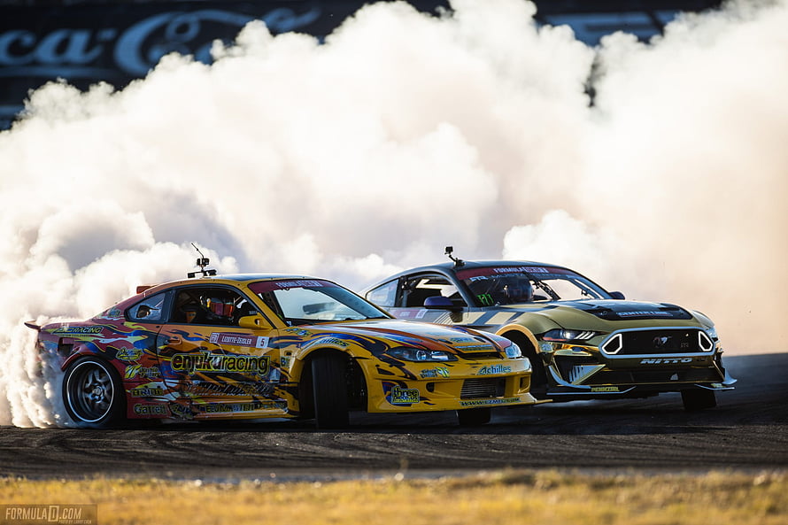 Tandem Drift Racing With Thick Tire Smoke On The Track HD wallpaper