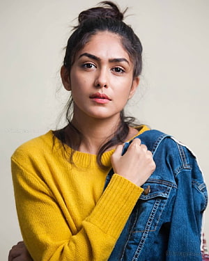 Mrunal Thakur Portrait in Yellow Sweater and Denim Jacket HD phone wallpaper