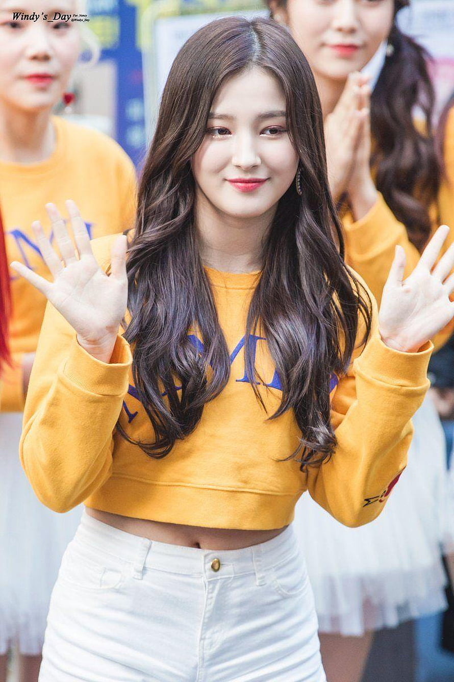 Nancy from Momoland Waving in a Yellow Crop Top and White Skirt HD phone wallpaper