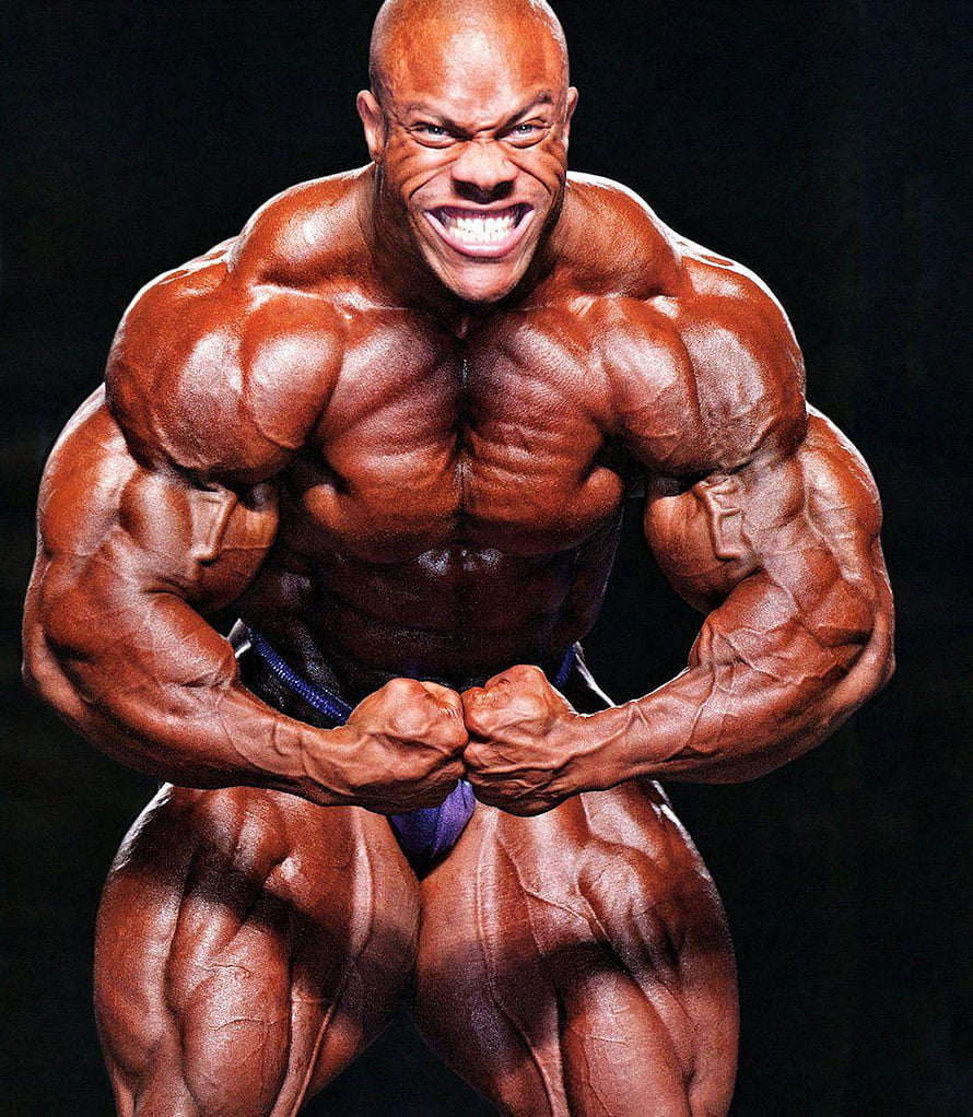 Phil Heath Mr Olympia Bodybuilding Pose with Intense Facial Expression and Defined Musculature HD phone wallpaper