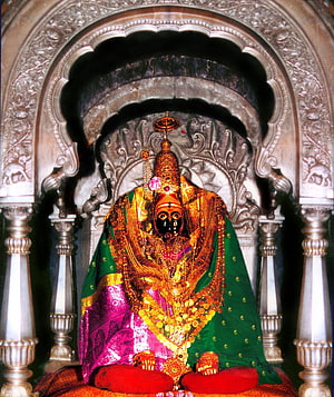 Tulja Bhavani Murti Adorned in Gold and Silk Within Ornate Temple Sanctum HD phone wallpaper