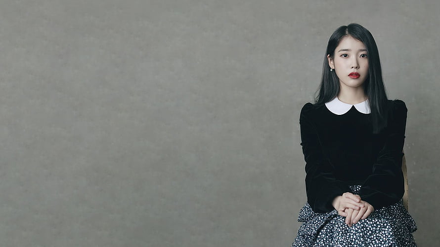 IU Studio Portrait in Black Velvet Top and Floral Skirt Against Grey Background HD wallpaper