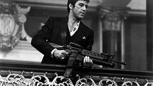 Tony Montana in Scarface Holding an M60 Machine Gun on a Balcony HD wallpaper