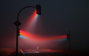 Traffic Signals Casting Red and Blue Light Beams Through Thick Night Fog HD wallpaper
