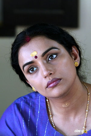 Swetha Menon Portrait in Blue Traditional Attire with Gold Jewelry and Bindu HD phone wallpaper