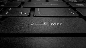 Close-Up of Black Keyboard Enter Key with Macro Photography Focus HD wallpaper