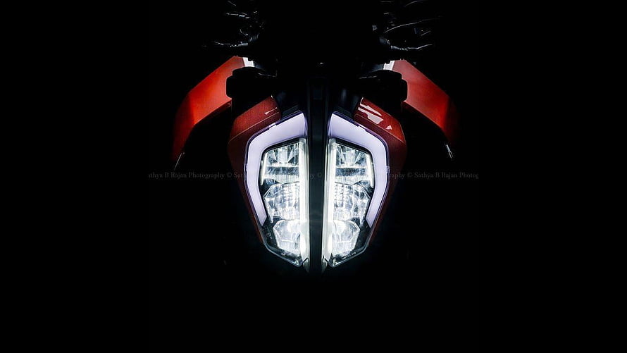 KTM Duke 390 Front Headlight Close-Up in Dark Setting HD wallpaper