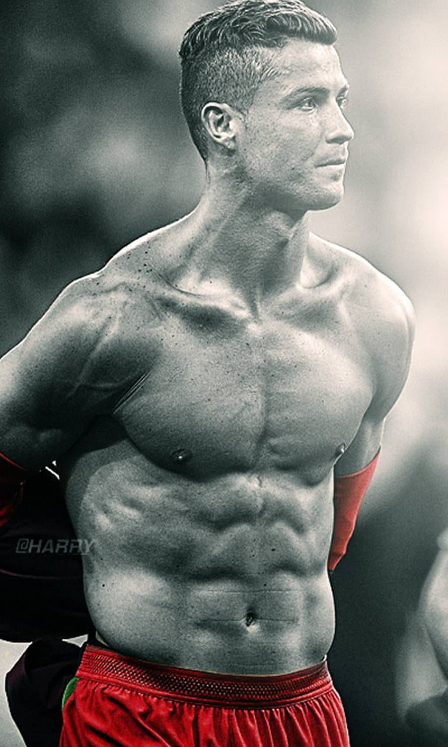Cristiano Ronaldo Shirtless Portrait with Red Shorts and Defined Physique HD phone wallpaper