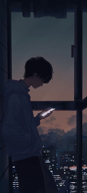 Anime boy looking at phone in a dark room with a city skyline at dusk HD phone wallpaper