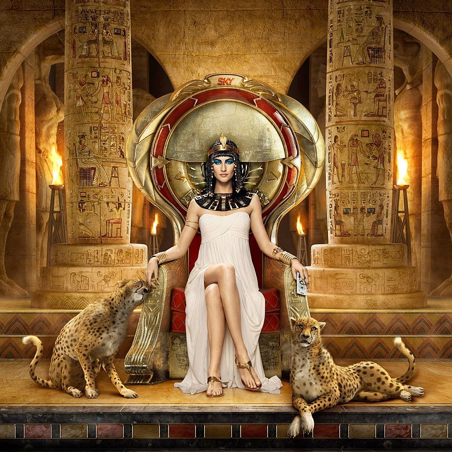 Cleopatra Seated on Golden Throne with Two Cheetahs in Ancient Egyptian Temple HD phone wallpaper