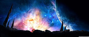 Vibrant Cosmic Nebula and Distant Planet Over Alien Rocky Landscape HD wallpaper