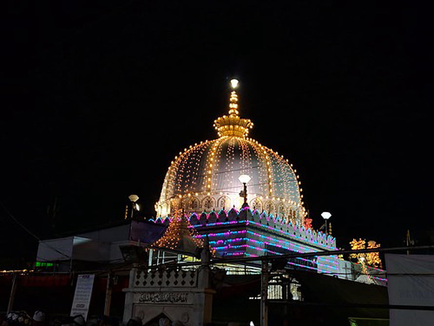 Illuminated Khwaja Ji Shrine Dome at Night with Festive String Lights HD wallpaper