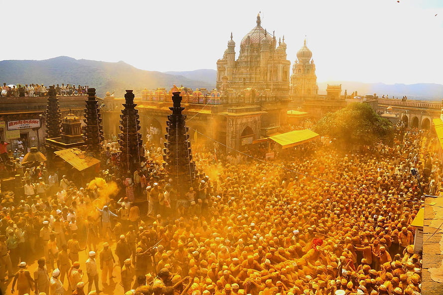 Jejuri Temple Festival Crowd Covered in Turmeric Powder During Laxmi Narayan Puja HD wallpaper