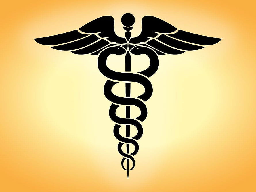 Black Caduceus Medical Symbol with Wings and Serpents on Golden Gradient Background HD wallpaper