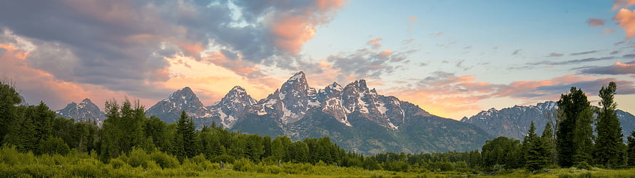Grand Teton National Park Mountain Range at Sunset with Pine Forest and Dramatic Sky HD wallpaper