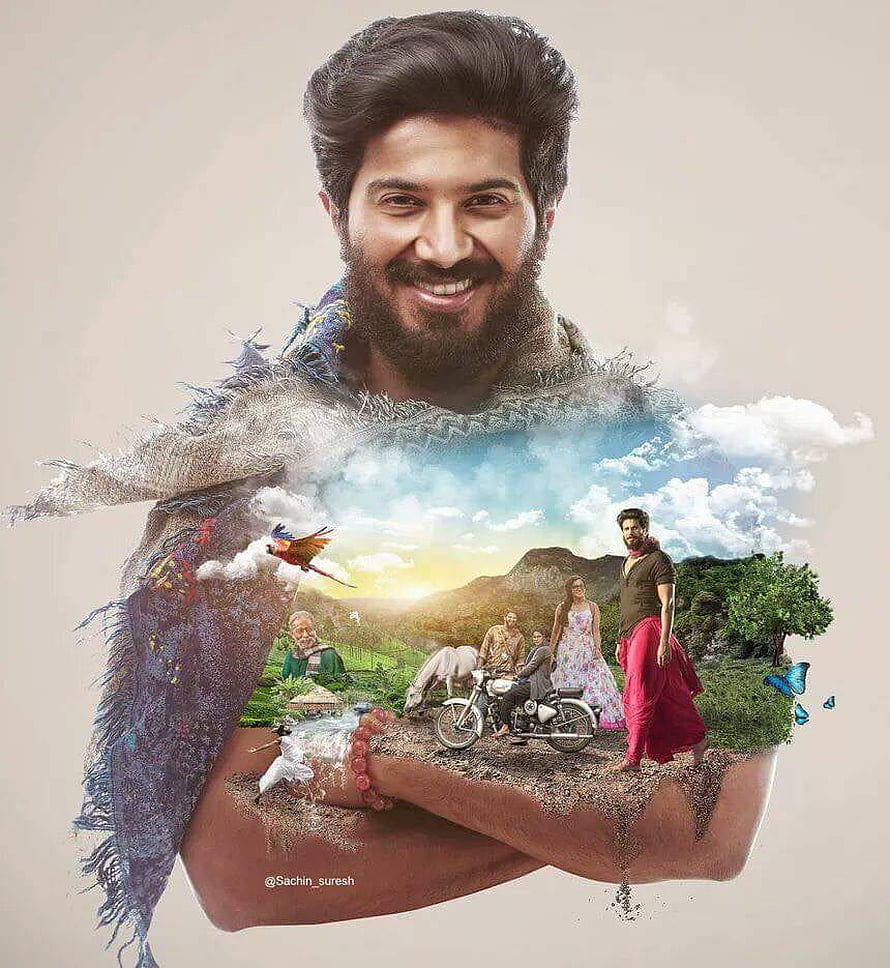 Dulquer Salmaan in Charlie Movie Poster with Rural Village Scene and Motorcycle HD phone wallpaper