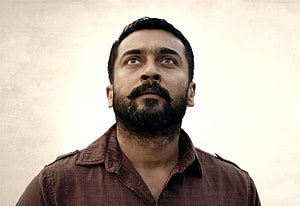Suriya in Soorarai Pottru Character Portrait with Beard and Brown Shirt HD wallpaper