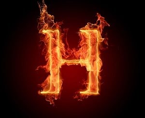Burning Letter H in Vivid Orange Flames Against a Dark Background HD wallpaper