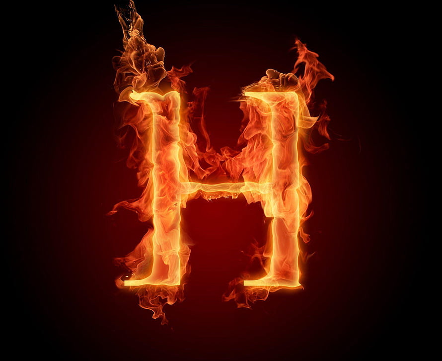 Burning Letter H in Vivid Orange Flames Against a Dark Background HD wallpaper