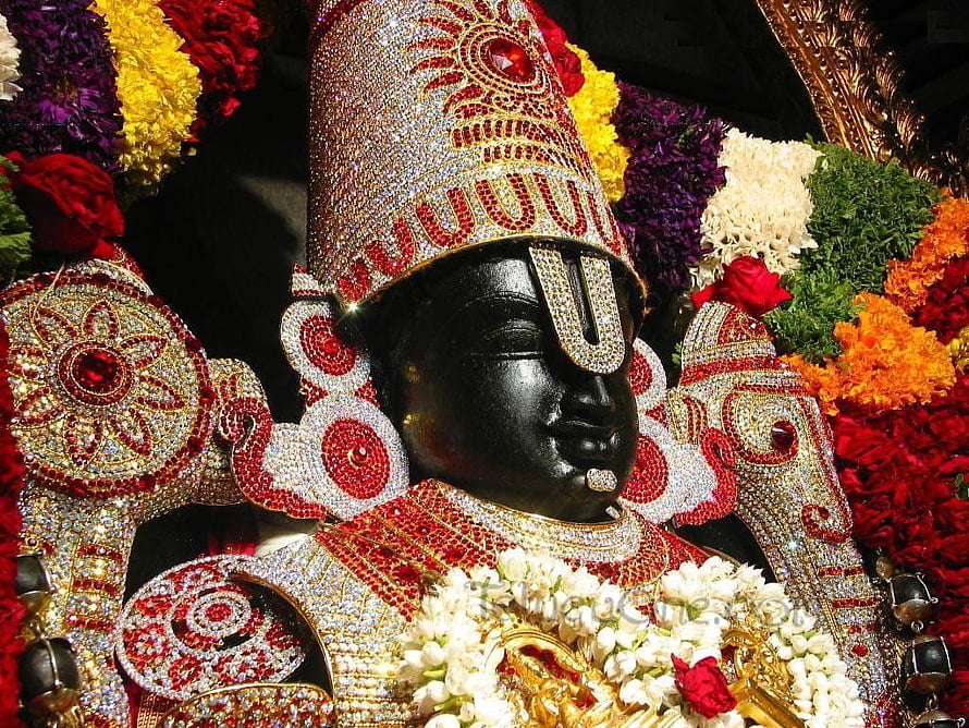 Lord Venkateswara Temple Idol Adorned in Jewels and Flower Garlands HD wallpaper