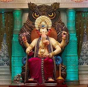 Lalbaugcha Raja Ganesha Murti with Owl Backdrop and Pink Dhoti HD wallpaper
