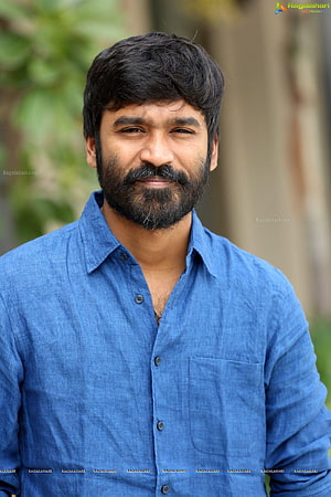 Dhanush Portrait in Blue Linen Shirt with Full Beard and Warm Smile HD phone wallpaper