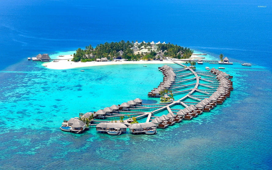 Aerial View of Luxury Overwater Bungalows on a Tropical Maldives Island Resort HD wallpaper