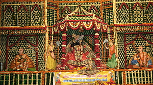 Banke Bihari Temple Altar Adorned With Marigold Garlands And Intricate Floral Tapestry HD wallpaper