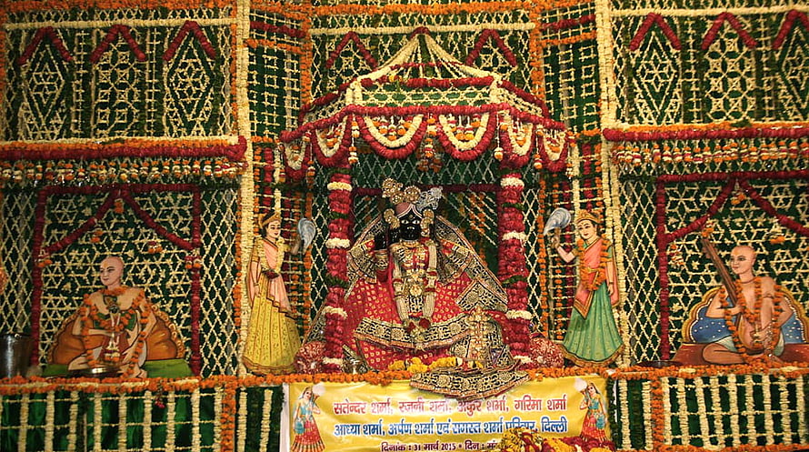 Banke Bihari Temple Altar Adorned With Marigold Garlands And Intricate Floral Tapestry HD wallpaper