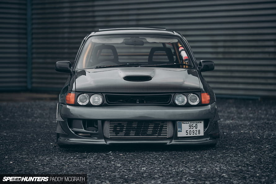Front View of a Modified Toyota Starlet Turbo with Hood Scoop and Front Bumper HD wallpaper