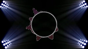 Abstract LED Light Show with Circular Dot Pattern and Stage Spotlights on Black Background HD wallpaper