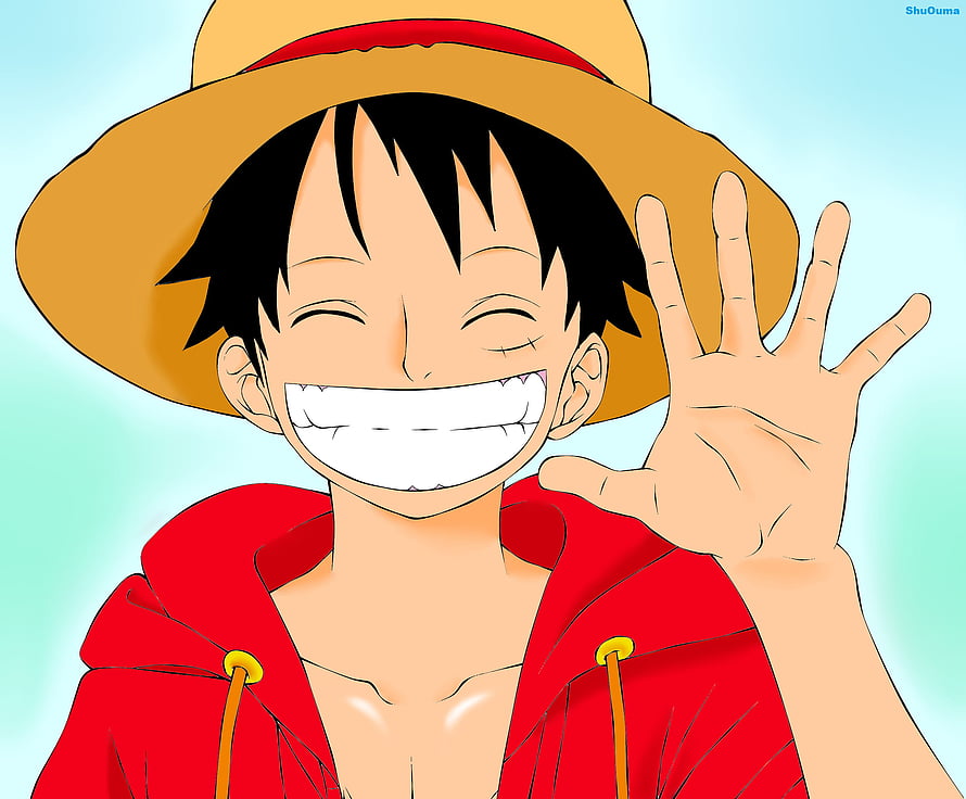 Monkey D. Luffy from One Piece smiling and waving in a red hoodie and straw hat HD wallpaper
