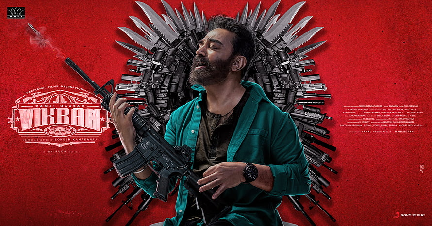 Vikram Movie Poster Featuring Kamal Haasan Holding Rifle Against Red Background HD wallpaper