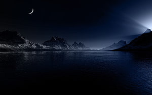 Dark Mountain Lake at Night with Crescent Moon and Dramatic Light Beams HD wallpaper