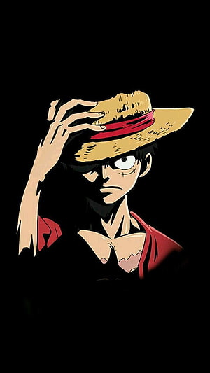 Monkey D. Luffy tipping his straw hat in a dramatic dark anime illustration HD phone wallpaper
