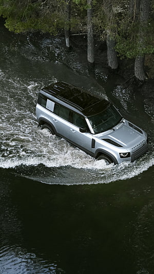 Silver Land Rover Defender 110 P400 X Forging Through Forest River Water HD phone wallpaper