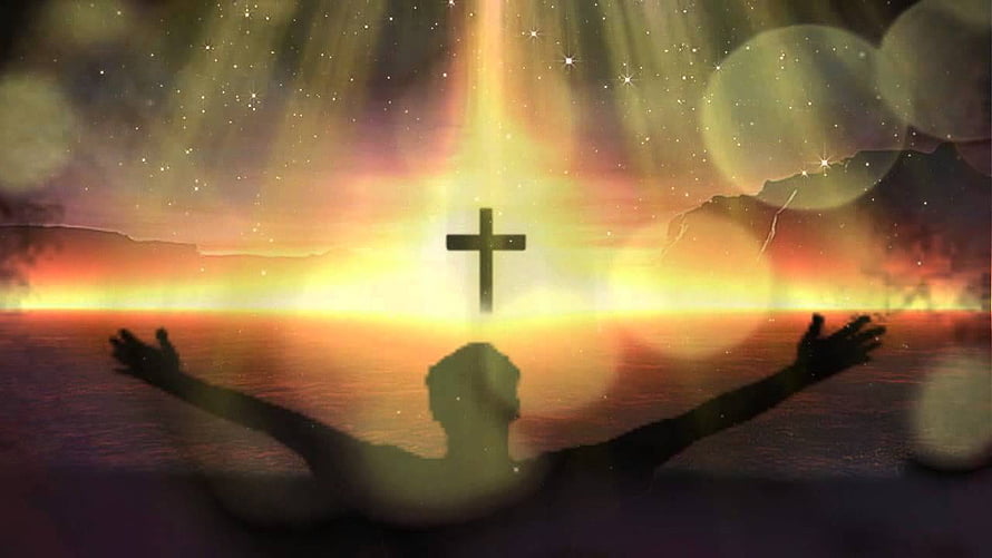 Silhouette of Worshipper with Arms Raised Before Glowing Cross at Sunset HD wallpaper