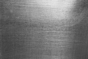 Brushed Metal Surface Texture with Subtle Scratches and Industrial Finish HD wallpaper