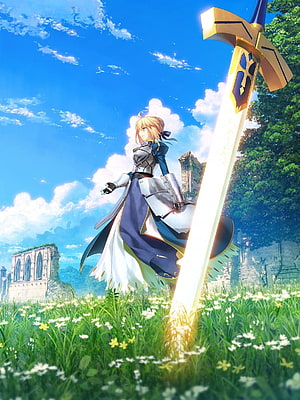 Saber from Fate Stay Night standing in a sunlit meadow with a glowing sword and castle ruins in the background HD phone wallpaper
