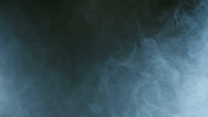 Ethereal Blue Smoke Swirling Against a Dark Moody Background HD wallpaper