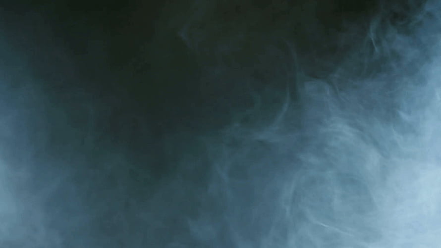 Ethereal Blue Smoke Swirling Against a Dark Moody Background HD wallpaper
