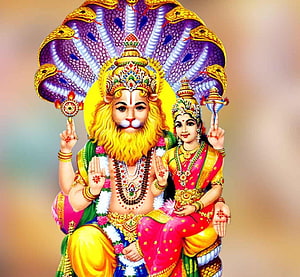 Lord Narasimha and Goddess Lakshmi with Multi-Headed Serpent Canopy in Traditional Indian Art HD wallpaper