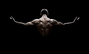 Muscular Male Back View With Star Tattoos Against Black Background HD wallpaper