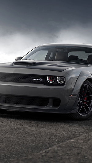 Dodge Challenger SRT Front View Under Dramatic Stormy Sky HD phone wallpaper